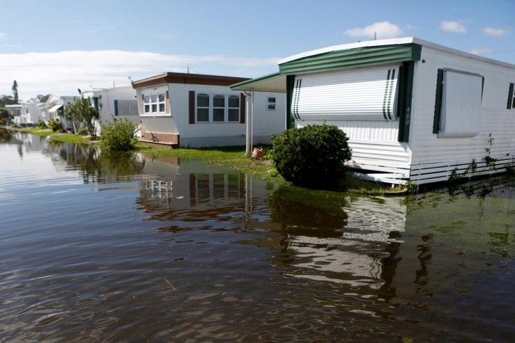 A view shows mobile homes surrounded by flood water after Hurricane Milton made landfall, in St. Petersburg, Florida