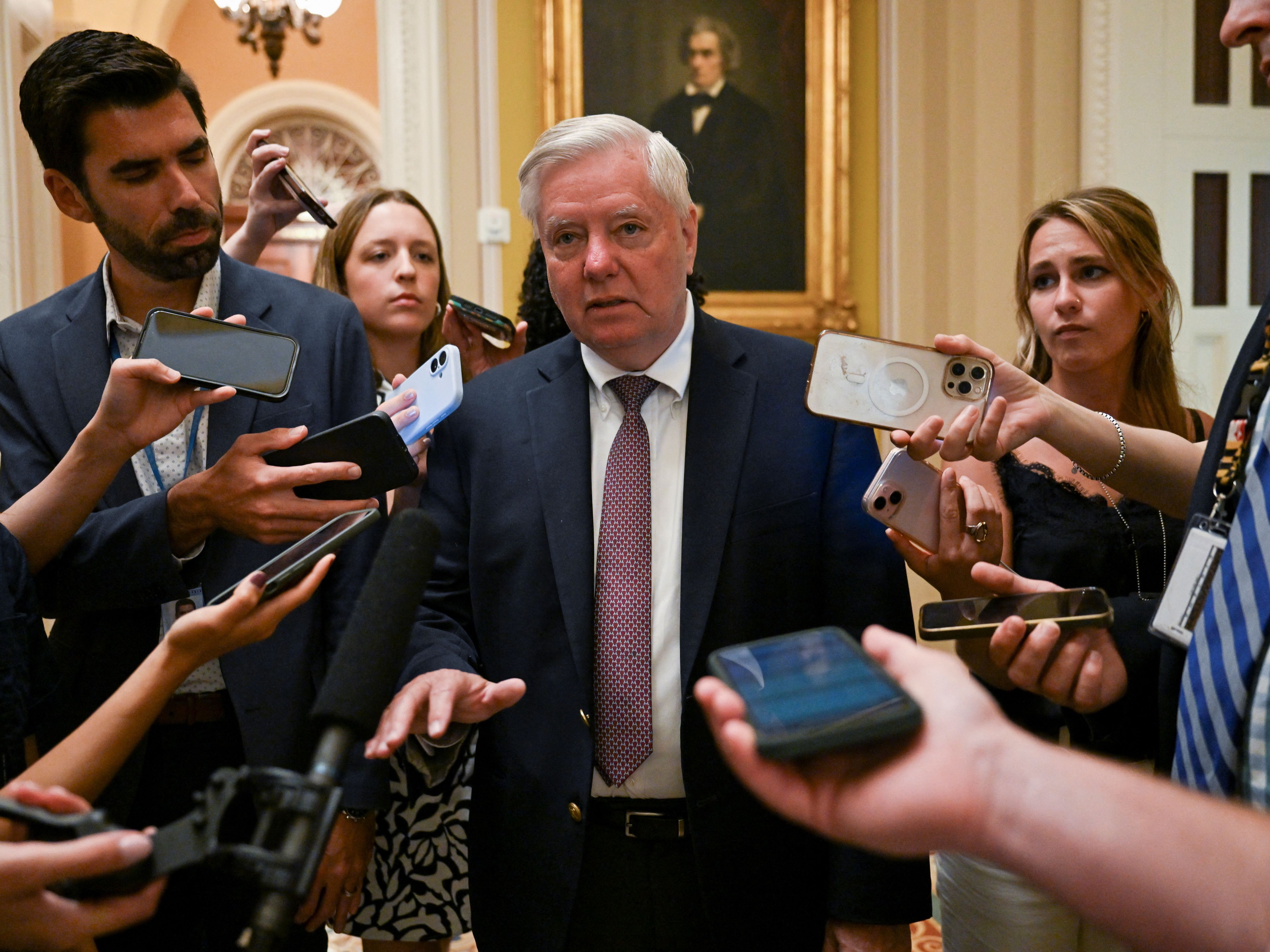 Reporters ask Lindsey Graham questions