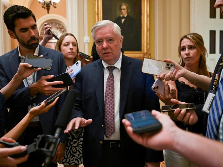 Reporters ask Lindsey Graham questions