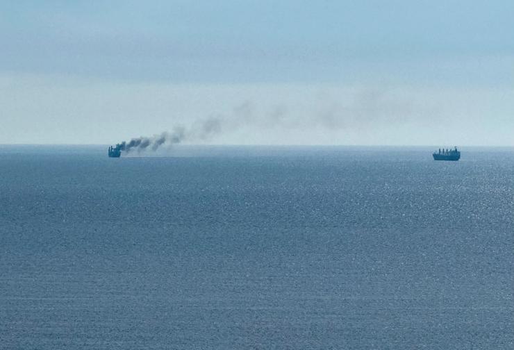 A civilian vessel is on fire, as Ukraine’s navy spokesman reported a Russian military strike on a civilian vessel.