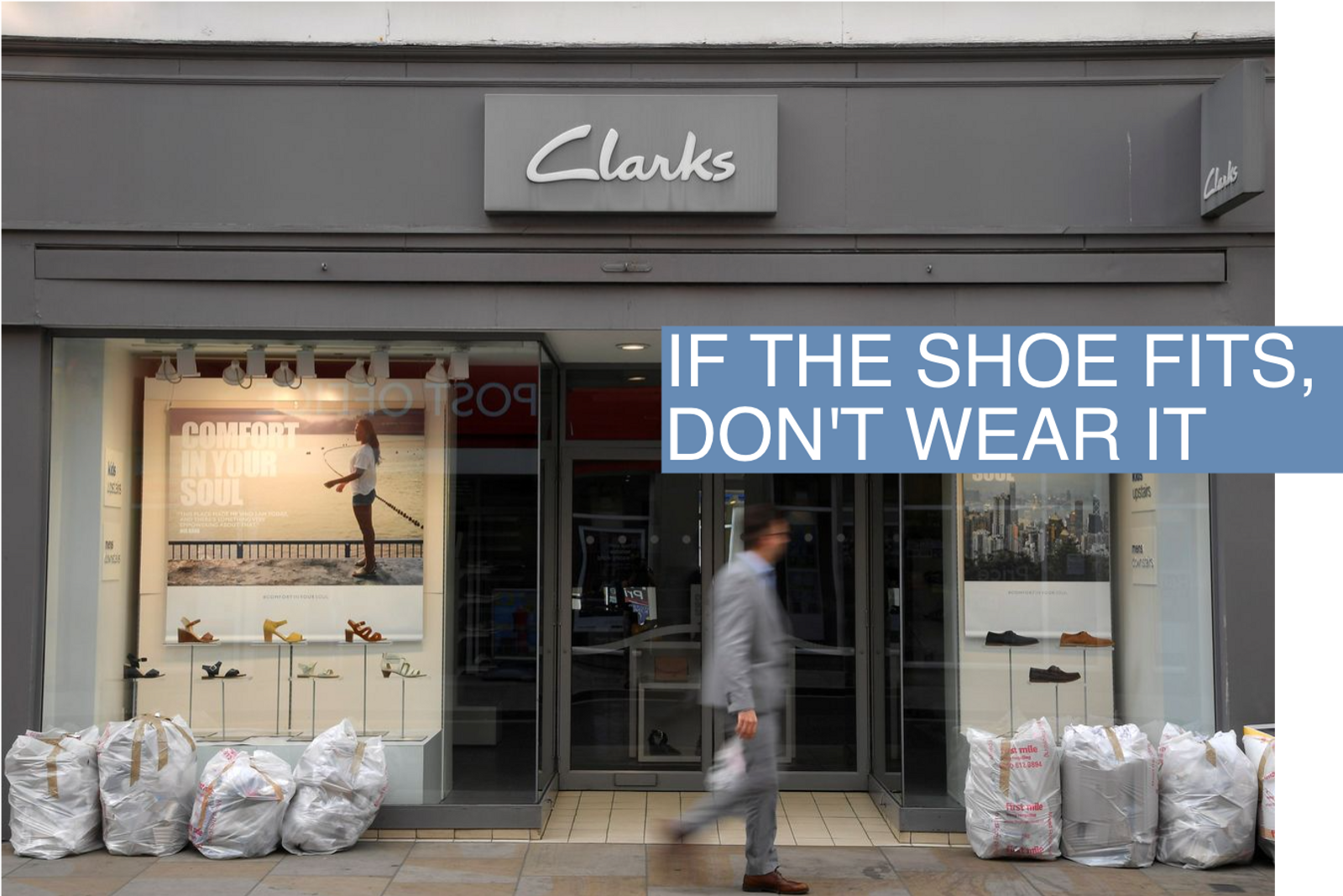 A man walks past a Clarks shoe shop in west London, Britain, May 21, 2018