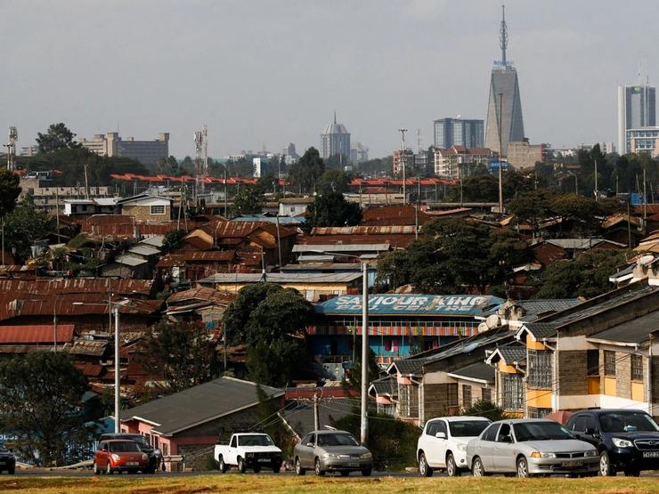Motorists drive past Kibera settlement in Nairobi on June 23, 2025.