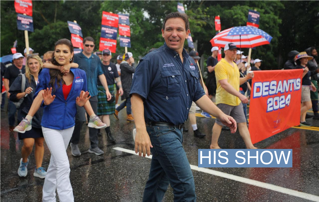 Republican presidential candidate Florida Governor Ron DeSantis, his wife Casey and their daughter Madison walk in the Fourth of July Parade in the rain in Merrimack, New Hampshire, U.S., July 4, 2023. 