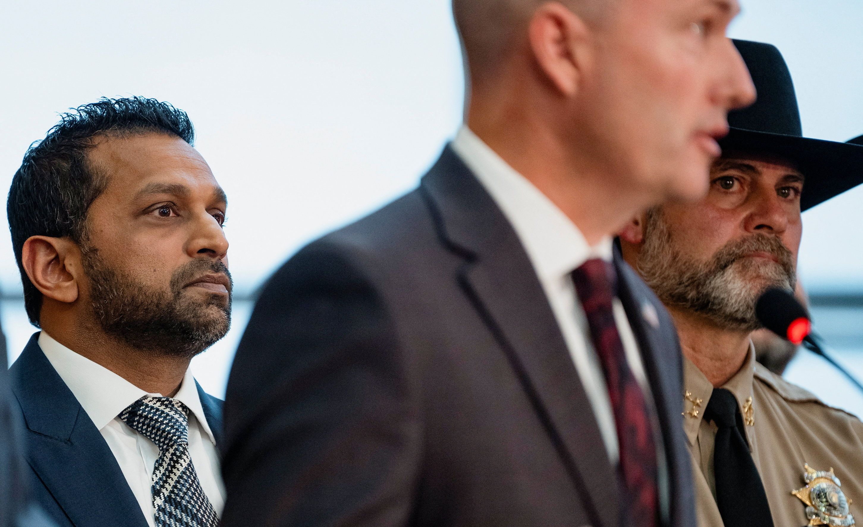 FBI Director Kash Patel, at left