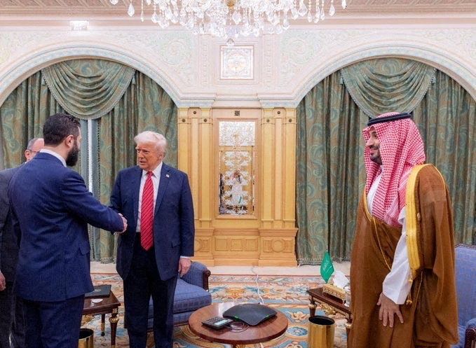 Syrian President Ahmed al-Sharaa meets with U.S. President Donald Trump and Saudi Crown Prince Mohammed Bin Salman in Riyadh.