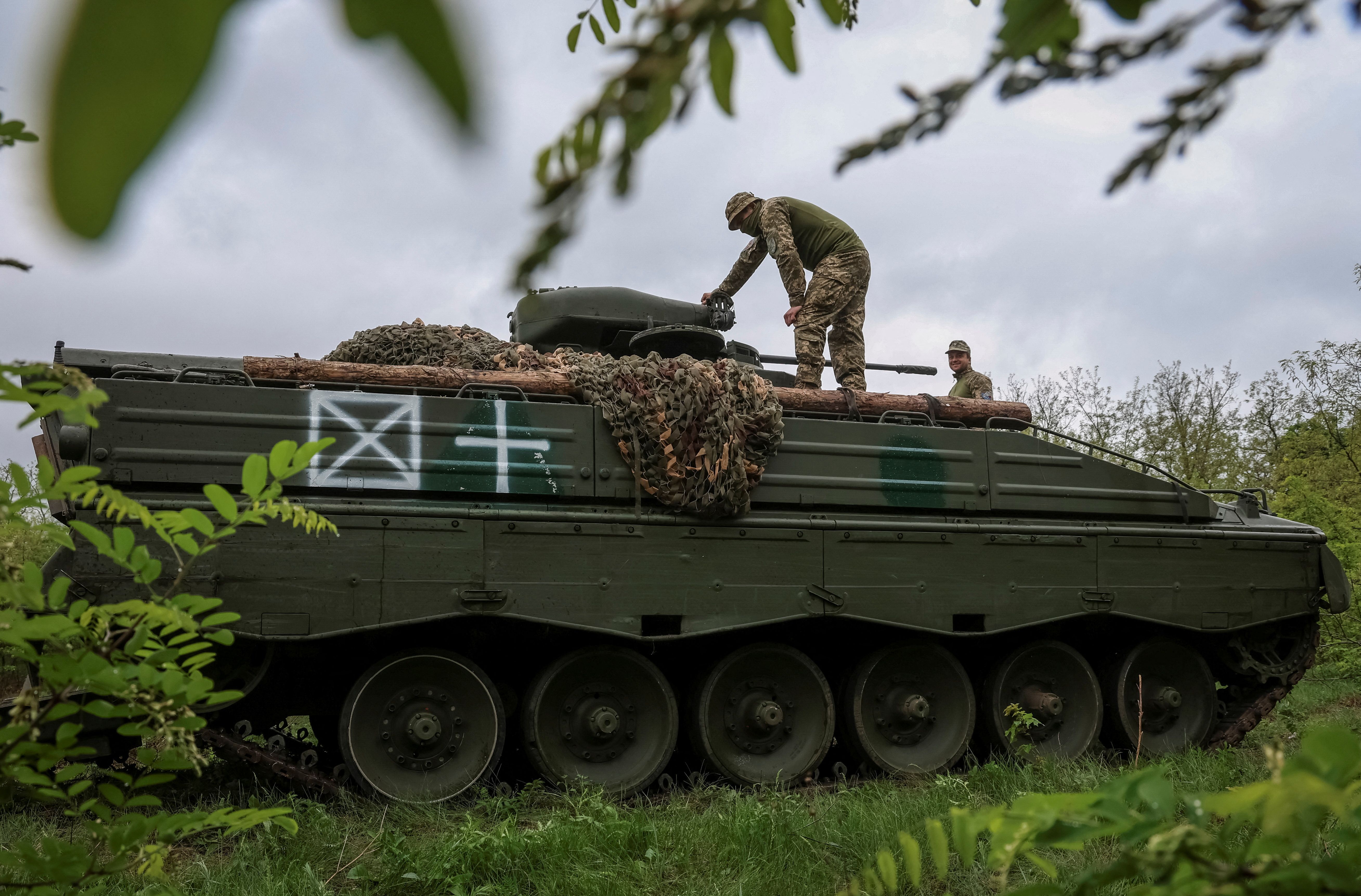 Ukrainian servicemen of the 25th Separate Airborne Brigade of the Armed Forces of Ukraine, stand on a Marder infantry fighting vehicle near a front line, amid Russia’s attack on Ukraine, in Donetsk region, Ukraine April 29, 2024. REUTERS/Oleksandr Ratushniak