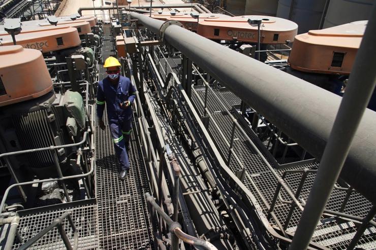 A worker is seen at an ore processing facility at the Kibali gold mine.