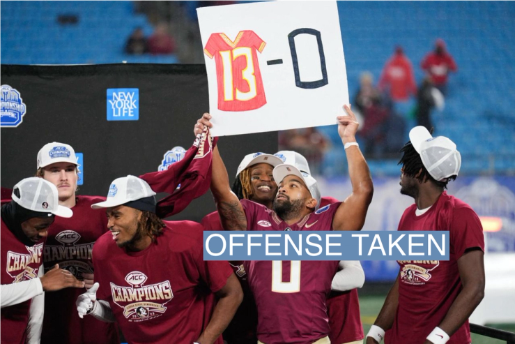 Florida State Seminoles wide receiver Ja’Khi Douglas (0) holds up a sign during the ACC Championship trophy presentation.