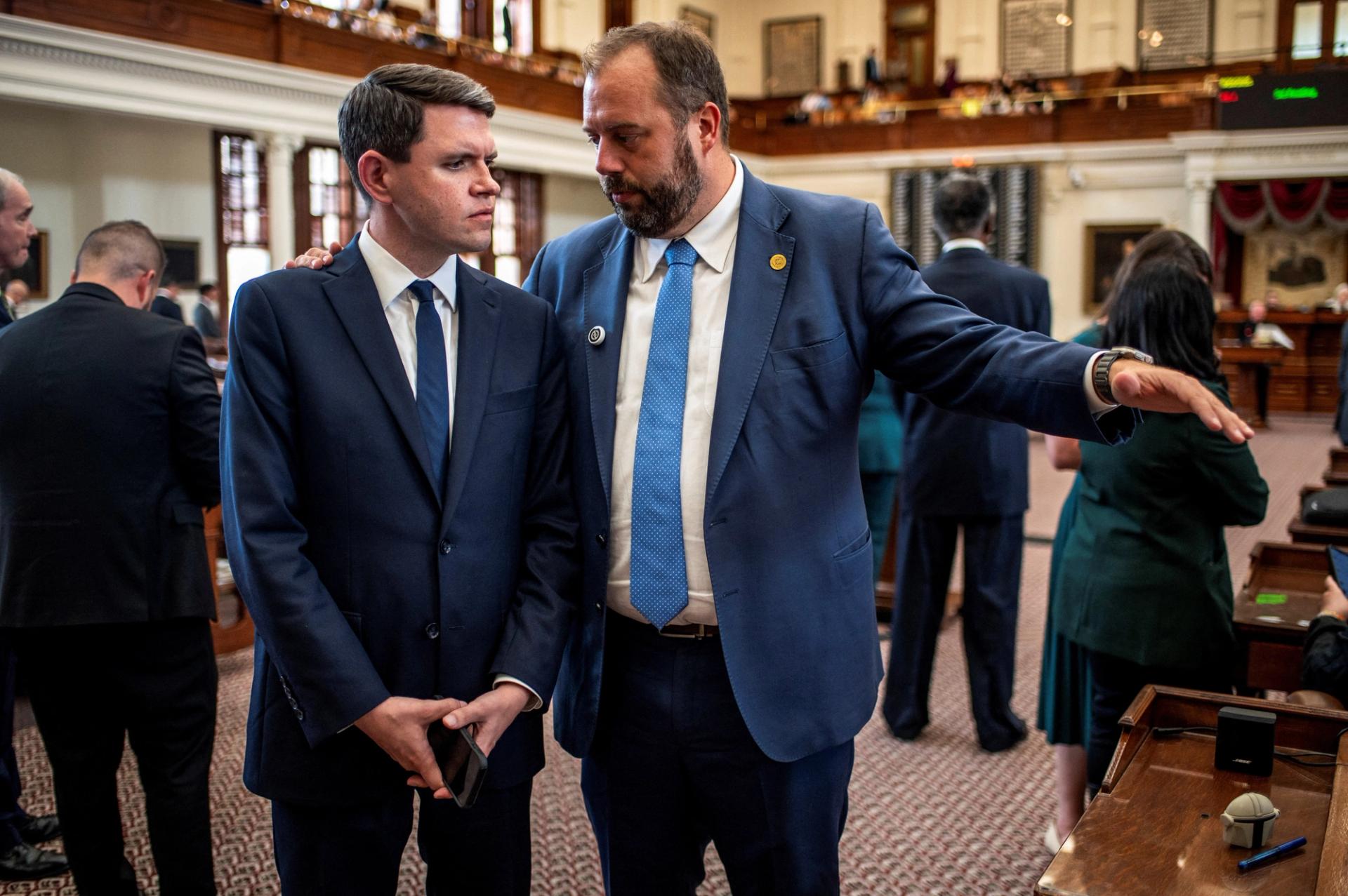 Texas State Representatives James Talarico and John Bucy III converse during a session as Democratic lawmakers begin returning to the Texas State Capitol in Austin, Texas, last month.