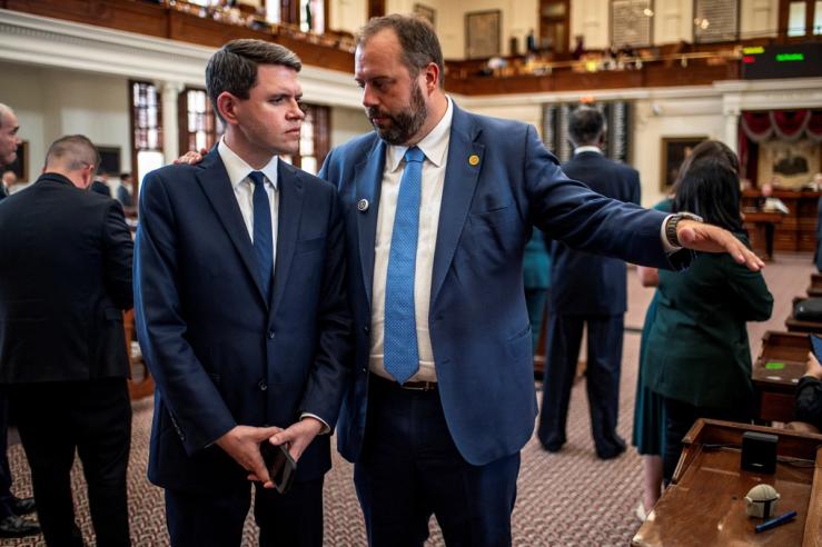 Texas State Representatives James Talarico and John Bucy III converse during a session as Democratic lawmakers begin returning to the Texas State Capitol in Austin, Texas, last month.