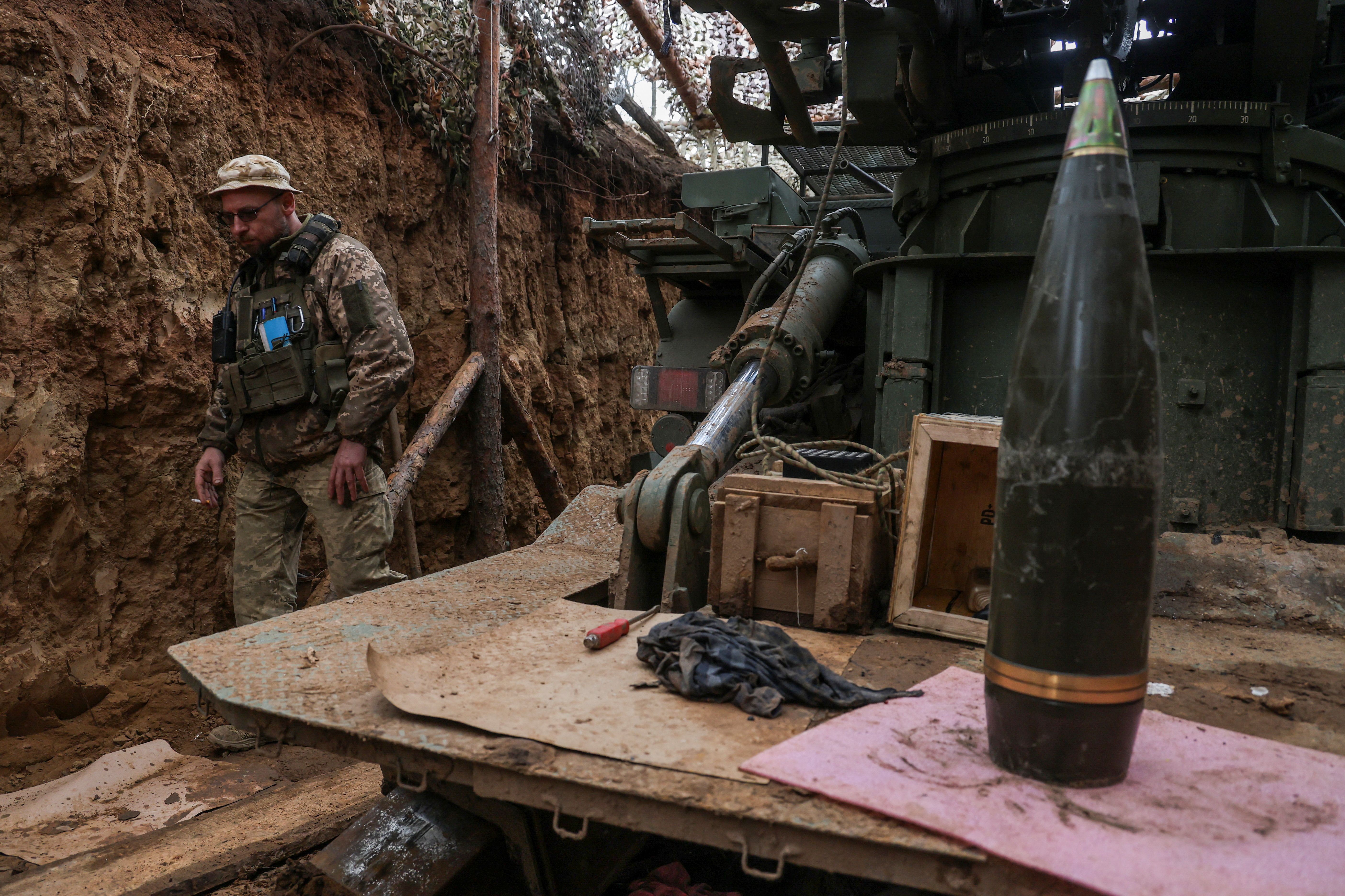 A Ukrainian serviceman of the 100th Separate Mechanized Brigade walks next to a Bohdana self-propelled howitzer at a position on a front line near the town of Toretsk, amid Russia’s attack on Ukraine, in Donetsk region, Ukraine April 7, 2025.