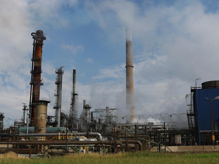 Smoke rises at the Natref oil refinery, South Africa’s only inland crude oil refinery, near Sasolburg, Free State province, South Africa.