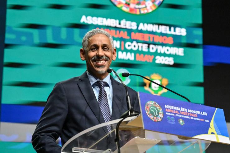 Mauritania’s Sidi Ould Tah stands at the podium before speaking after he was elected as the new president of the African Development Bank group in Abidjan.