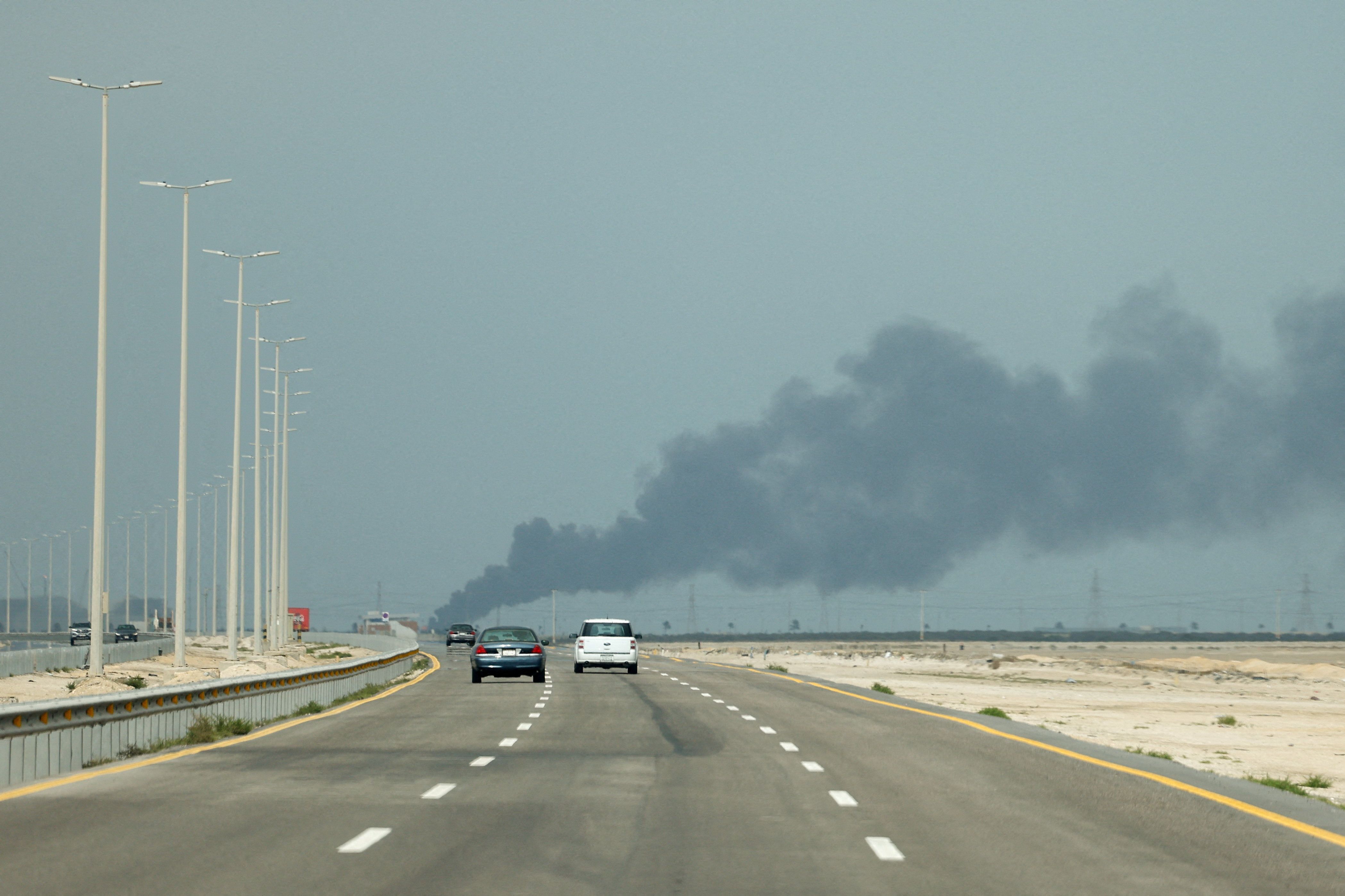 Smoke billows from Saudi Aramco’s Ras Tanura oil refinery after a reported Iranian drone strike.