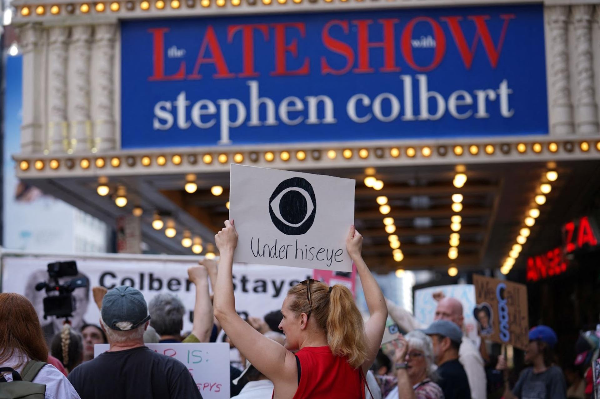Protestors outside the theatre where The Late Show is taped.