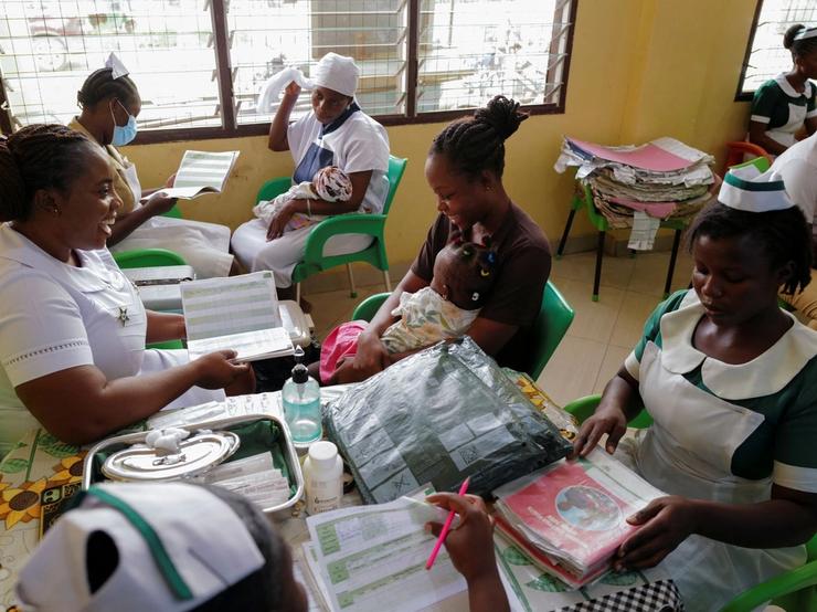 Health workers prepare to vaccinate infants at the Mother and Child Hospital in Kasoa, Ghana.