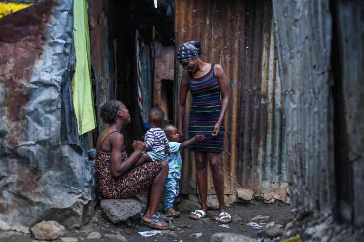 A mother is seen with her child on Mothers’ Day at Mathare slum in Nairobi, Kenya.