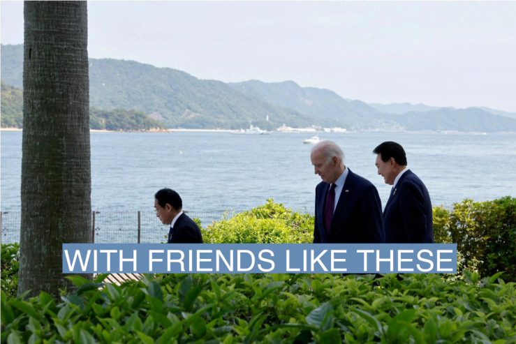 U.S. President Joe Biden walks with Japan?s Prime Minister Fumio Kishida and South Korea?s President Yoon Suk Yeol on the day of trilateral engagement during the G7 Summit at the Grand Prince Hotel in Hiroshima, Japan, May 21, 2023.