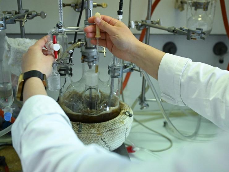 A person works in a science lab