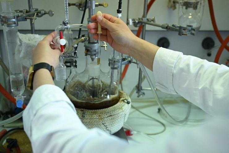 A person works in a science lab