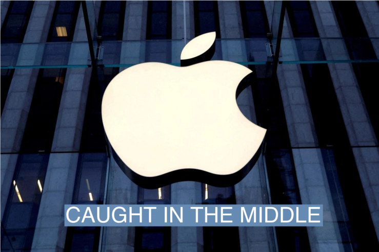 The Apple Inc. logo is seen hanging at the entrance to the Apple store on 5th Avenue in Manhattan, New York, U.S., October 16, 2019. REUTERS/Mike Segar/File Photo