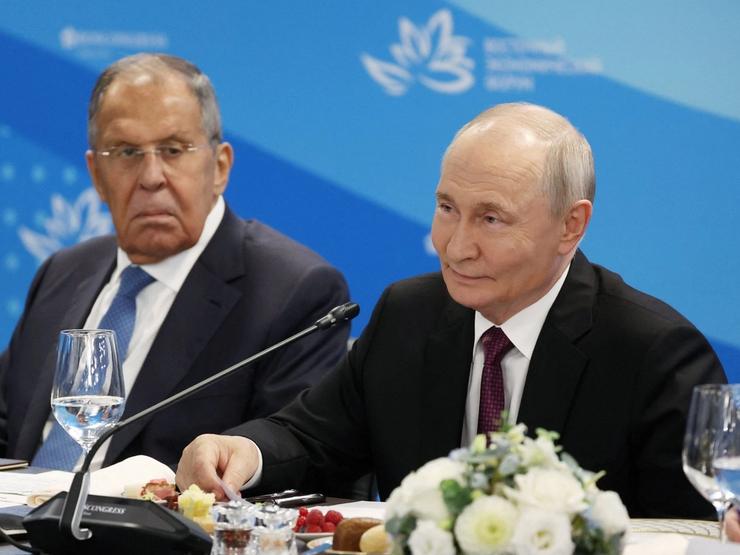 Russia’s foreign minister Sergei Lavrov and President Vladimir Putin.