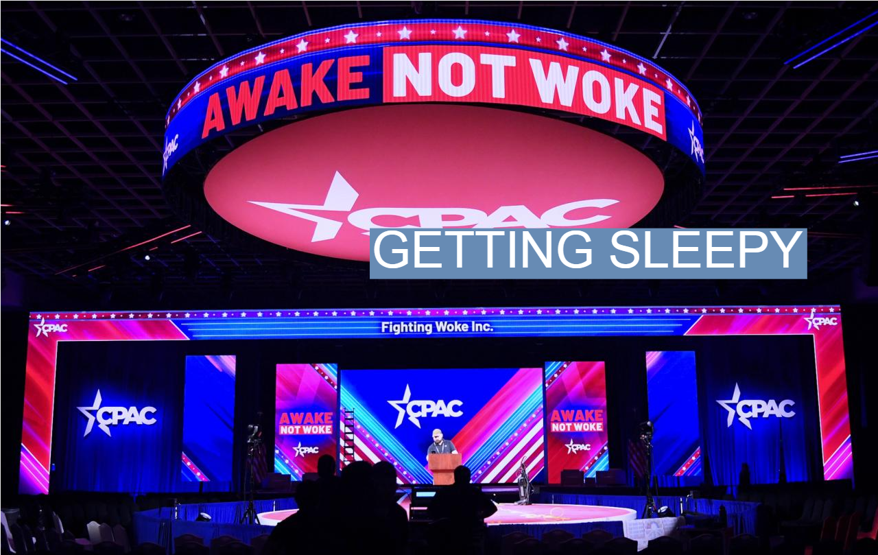 Workers prepare the stage for the 2022 meeting of the Conservative Political Action Conference.