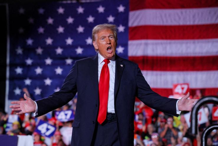 Donald Trump attending his campaign rally at Macomb Community College in Warren