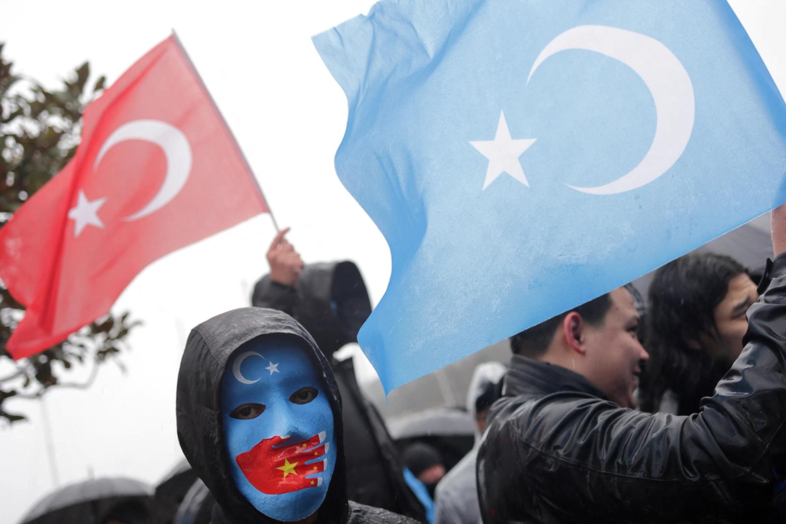 Ethnic Uyghur demonstrators wave flags of Turkey and East Turkestan during a protest against China, near the Chinese consulate in Istanbul, Turkey February 5, 2023. REUTERS/Murad Sezer