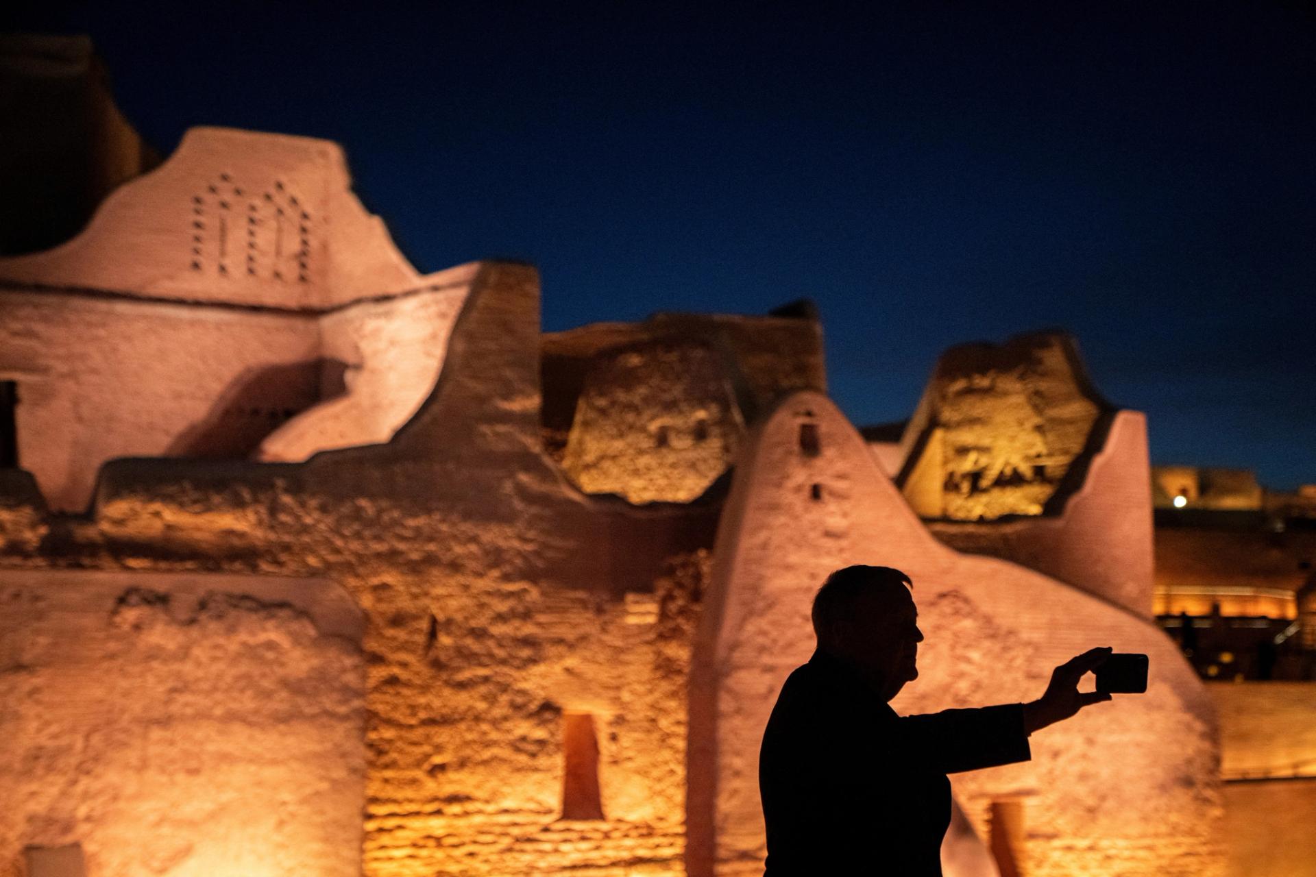 Denmark’s Foreign Minister Lars Loekke Rasmussen is silhouetted as he visits the restored ruins in Diriyah, Saudi Arabia, February 2, 2025.