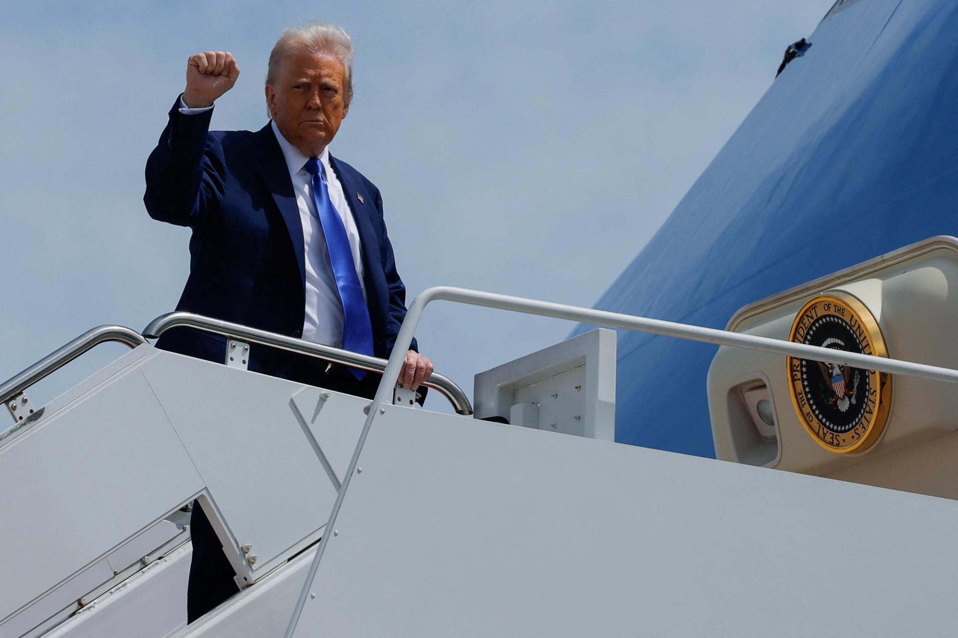Trump boards Air Force One for his trip to the Gulf.