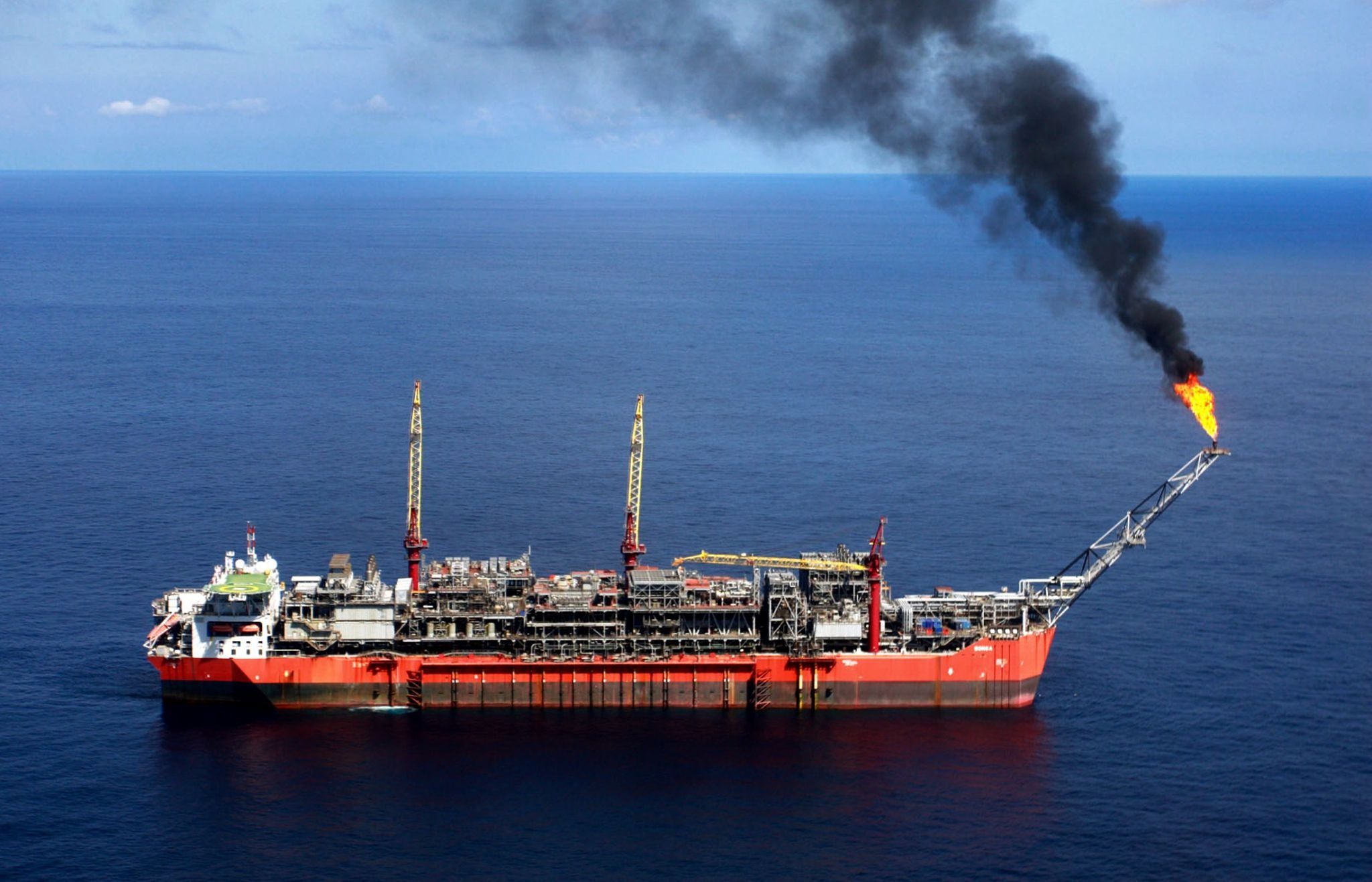 A ship loads crude oil at Bonga off-shore oil fields outside Lagos.